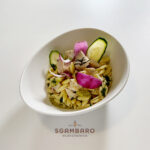 Gnocchetti Sardi with tuna and red onion petals in a courgette sauce and aromatic herb pesto