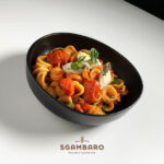 Orecchiette with a plum tomato, basil oil and strong ricotta sauce