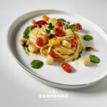 Spaghettoni with cuttlefish, oven-baked tomatoes and parsley sauce